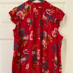 Red floral blouse